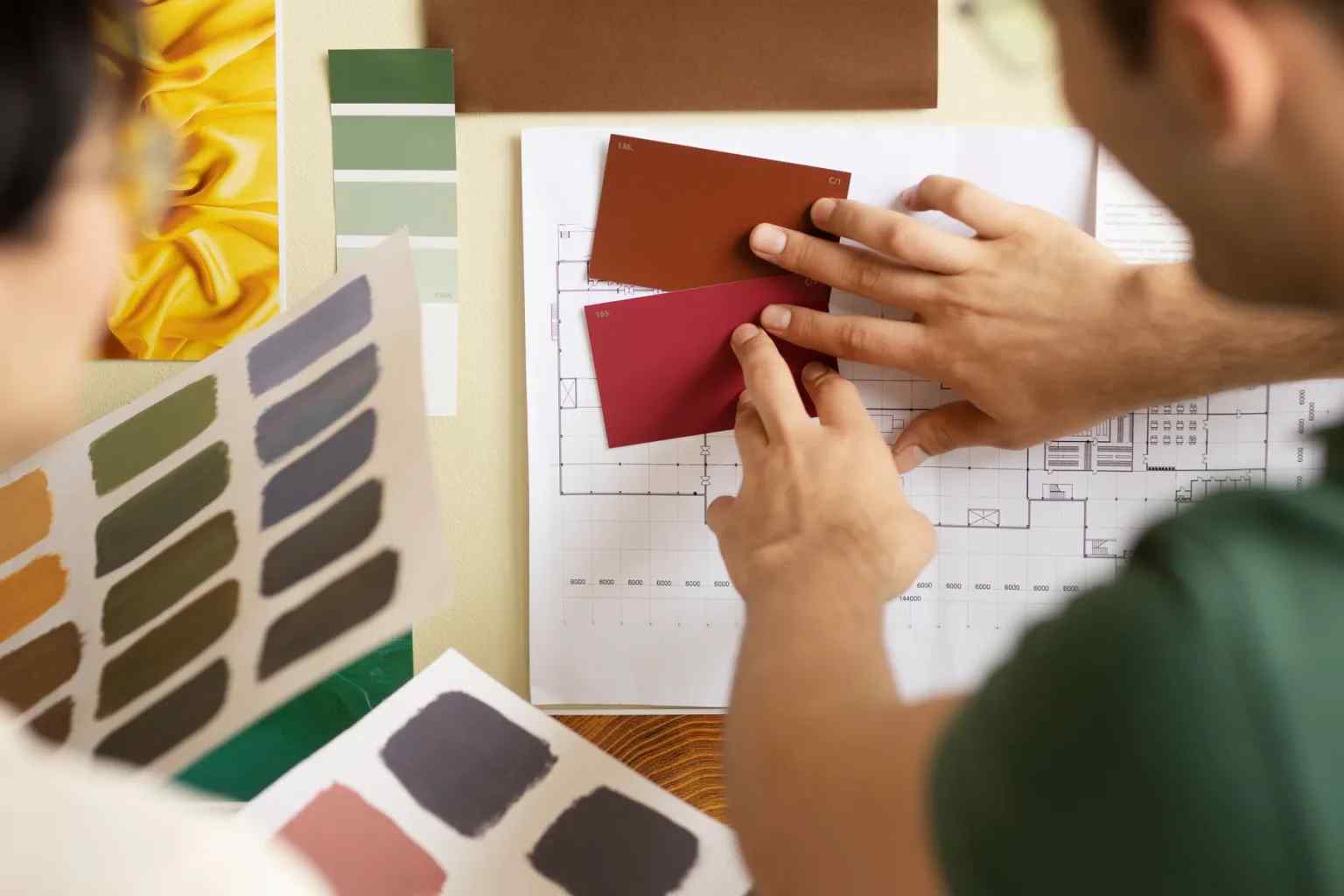 Quality professionals comparing product construction with an approved benchmark